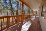 Relax on the Porch while enjoying the Pines